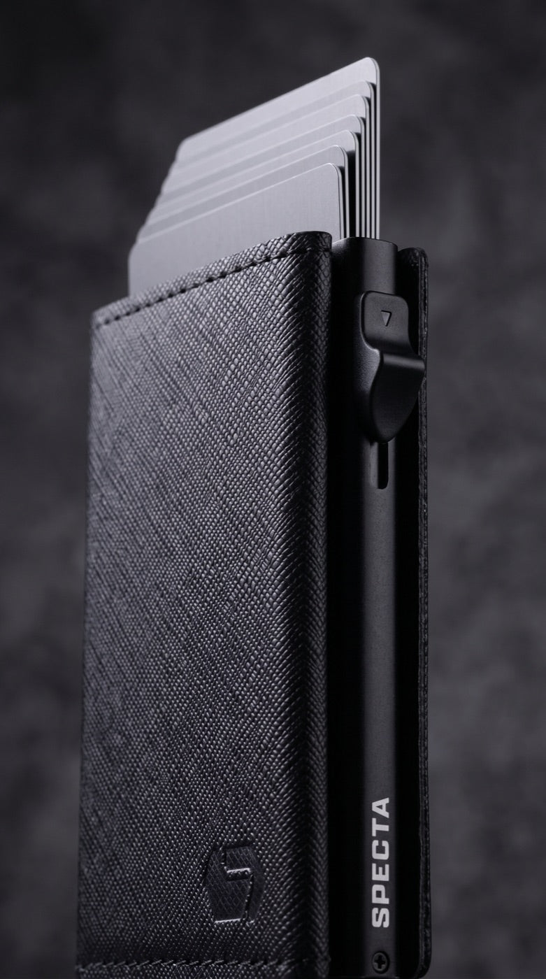 SPECTA black Saffiano pop-up cardholder — close-up of the side lever and pop-up card mechanism